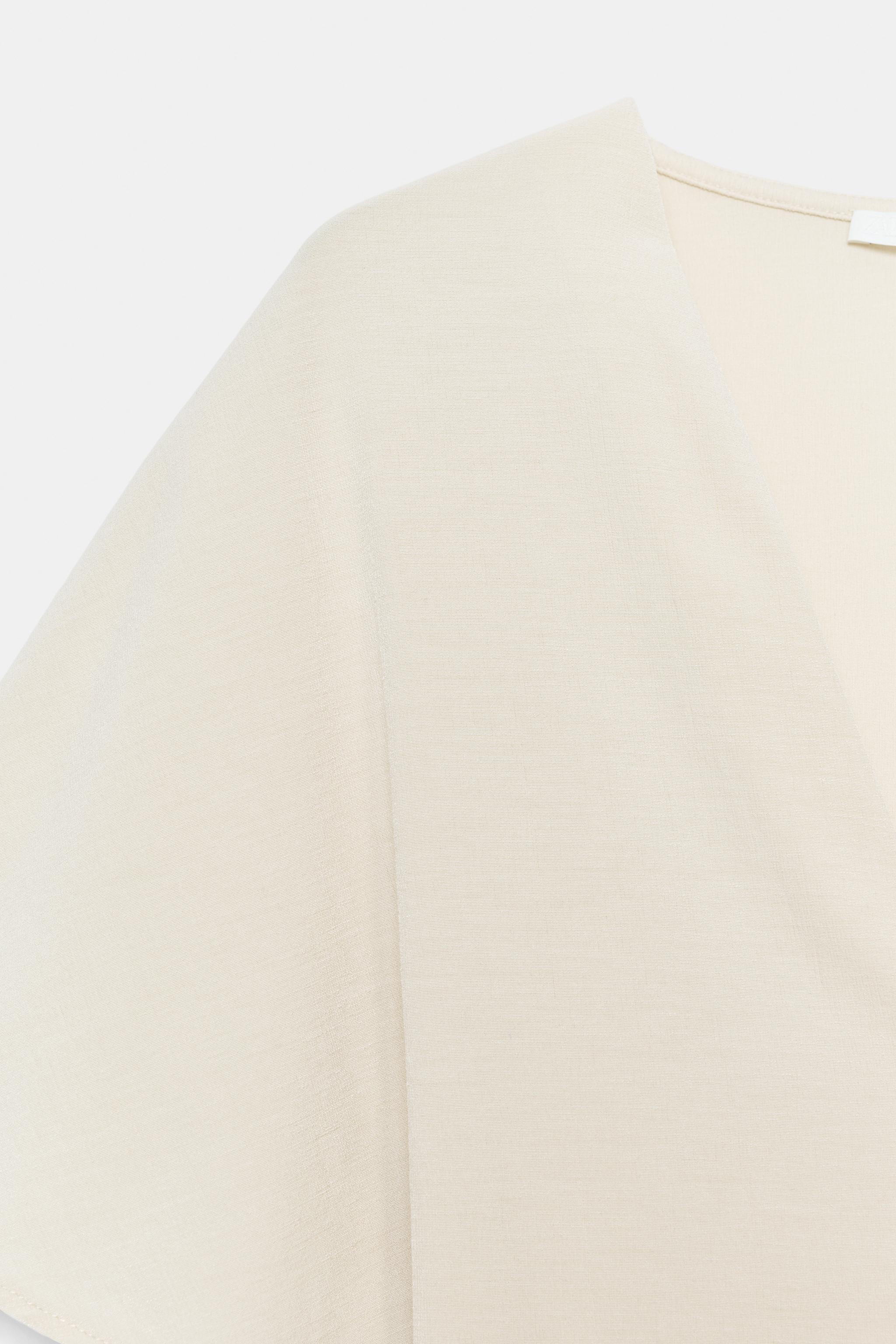 FLOWY V-NECK TOP